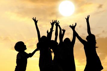 Children playing in the sun