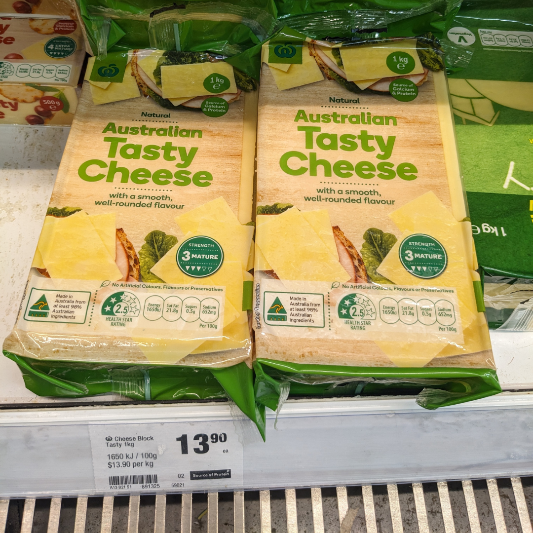 Image of price of 1kg cheese at woolworths costing $13.90