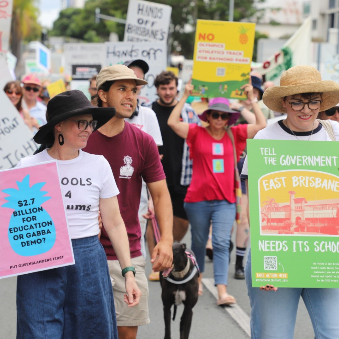 Penny Allman-Payne marching at public schools rally 