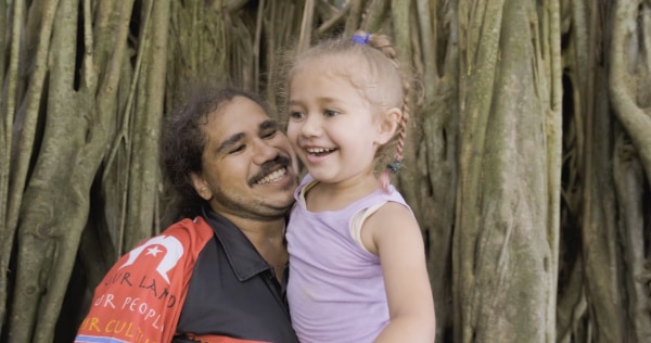 Dad and daughter playing