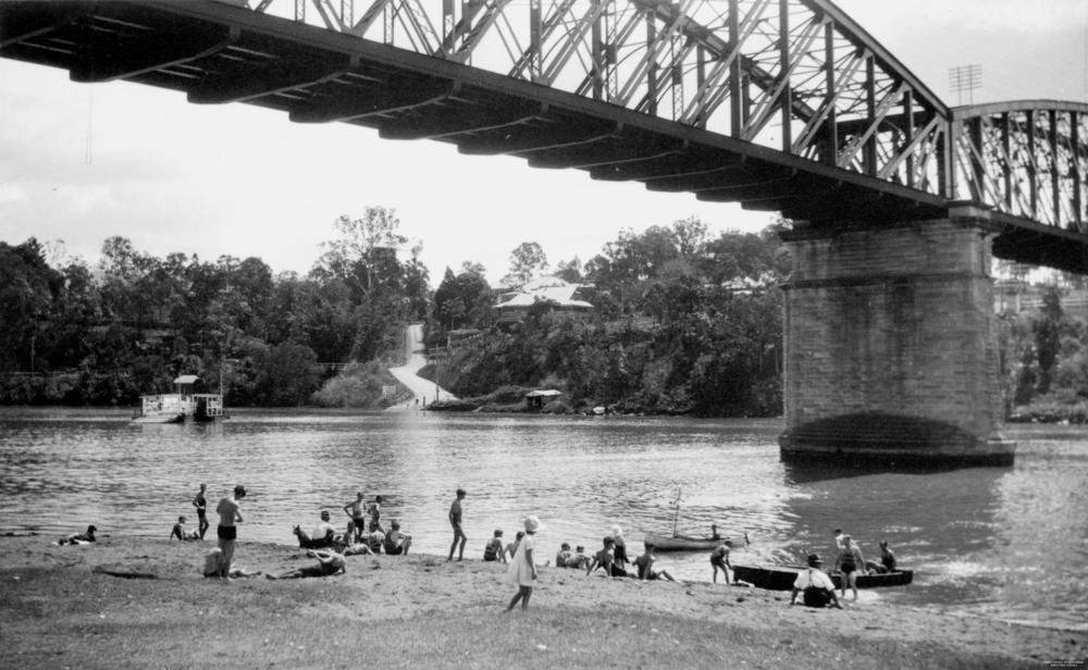 Swimmers cooling off in the Brisbane River at Chelmer