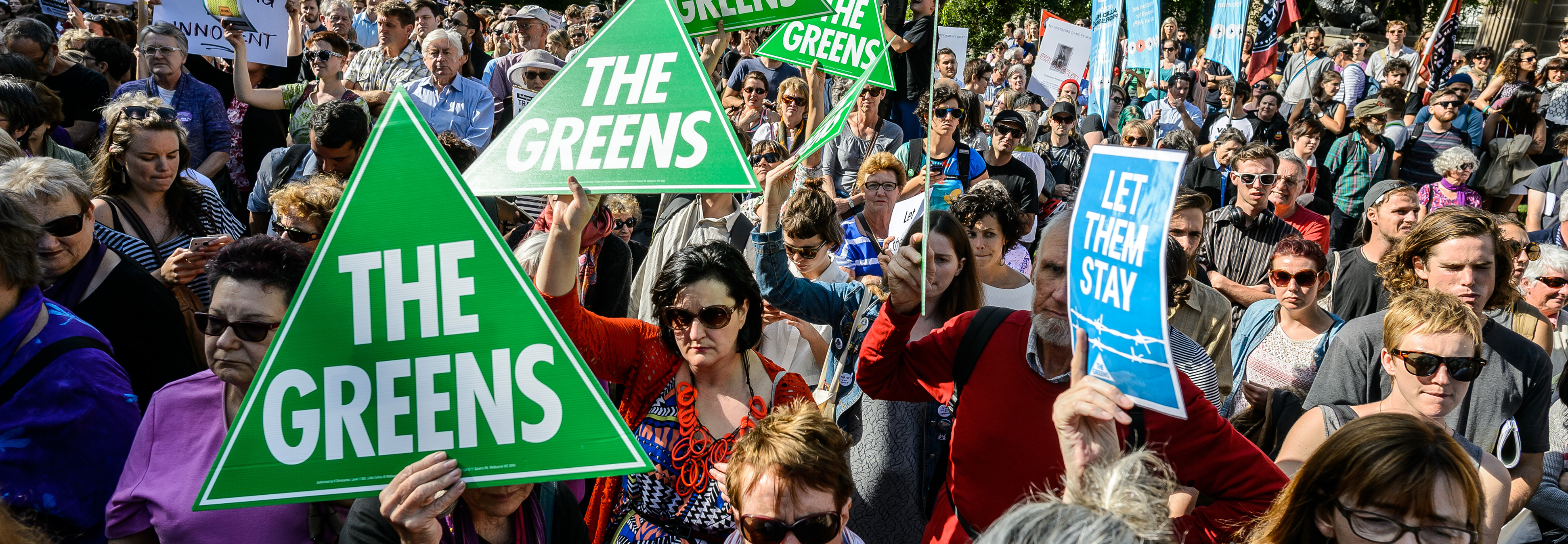 Protest with Greens signs