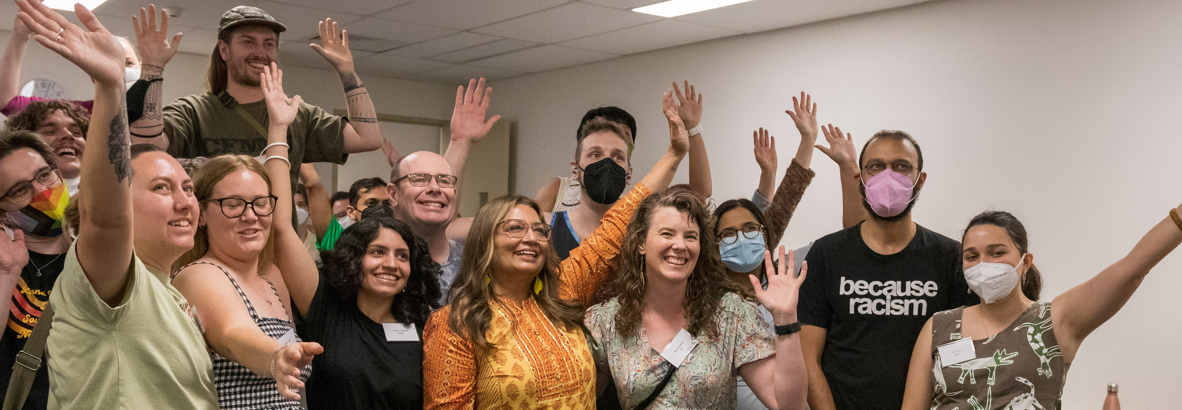 workshop image.jpg Image of smiling Greens at a conference workshop