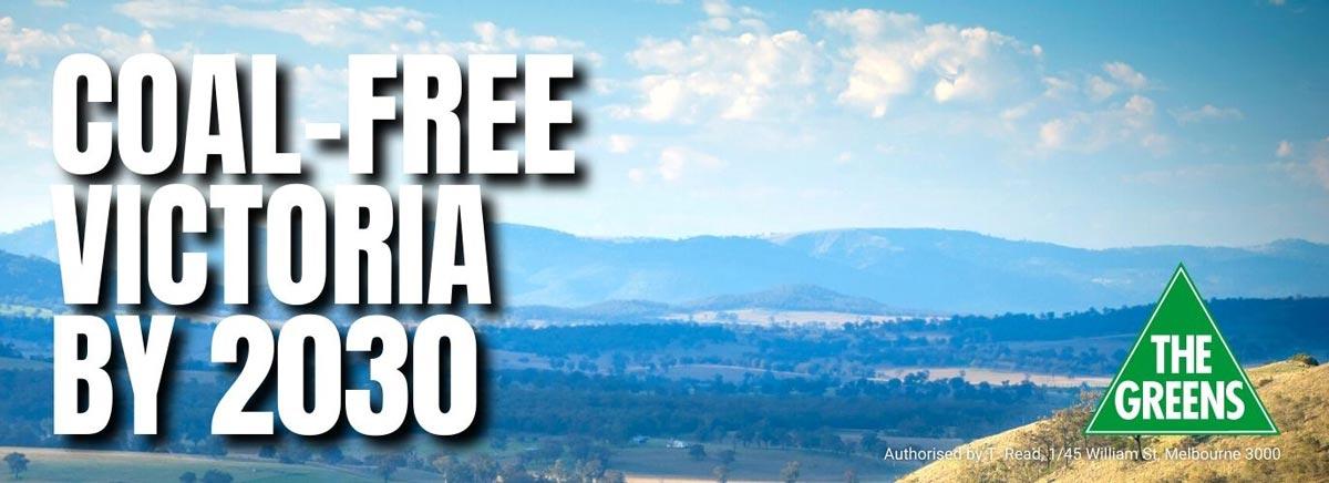 Large white text says: Coal-free Victoria by 2030. In the bottom right corner is a Greens logo. In the background is a blue sky, clouds, mountains, rolling green hills and trees.