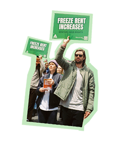 protest marchers holding freeze rent increases signs